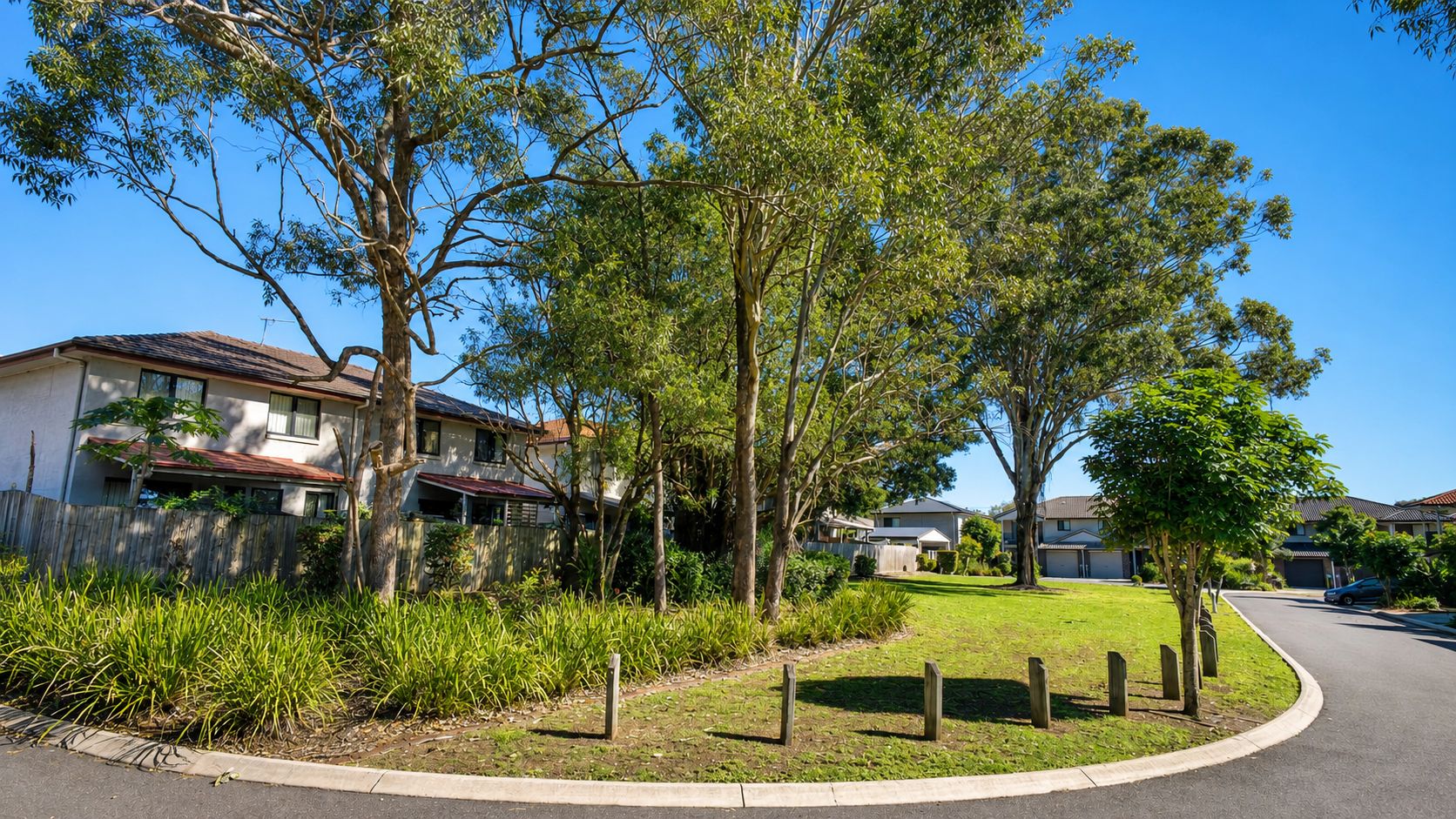 Green lawn and mature trees at AcaciaFields