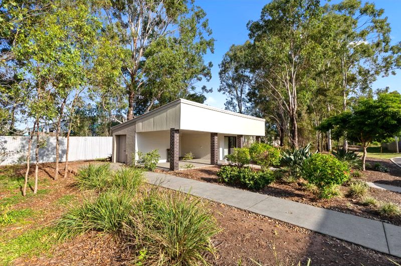 Landscaped exterior of the AcaciaFields gym building