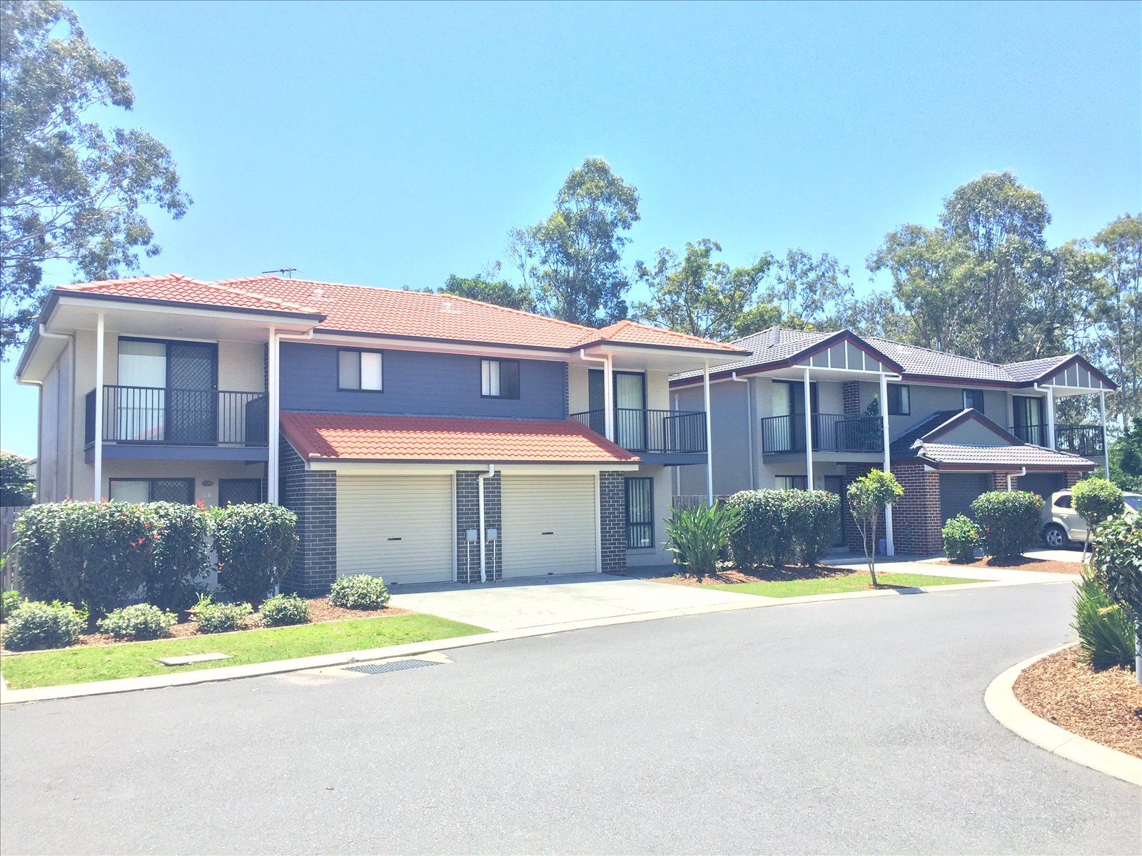 Townhouse row and landscaped frontage at AcaciaFields